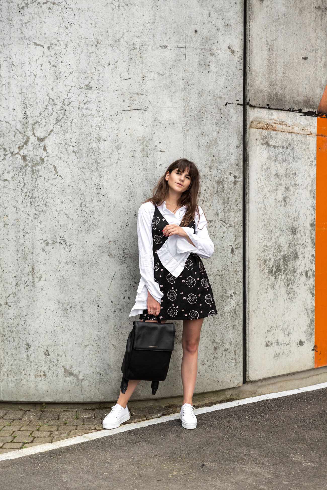 black dress with white shirt under