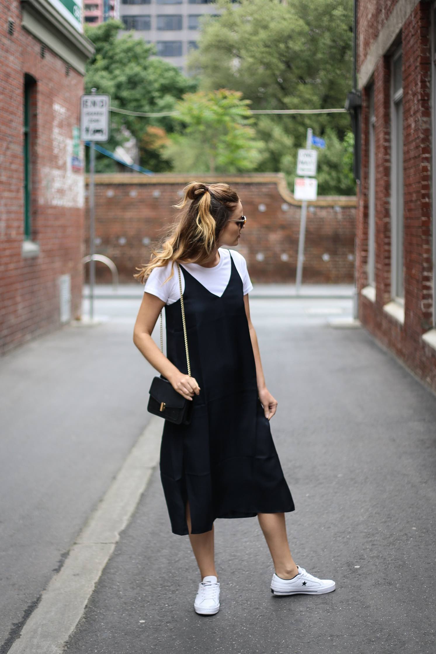 black dress with white top underneath