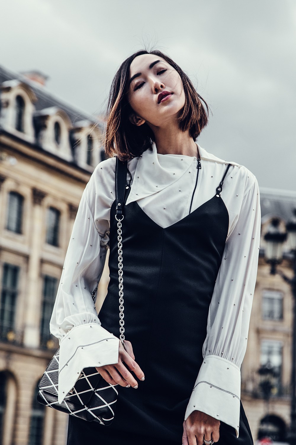 black dress with white shirt under